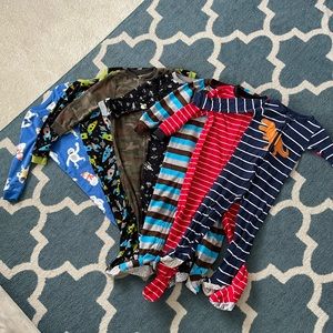Set of 7 4T Carter’s Footie Pajamas